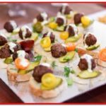 Meatballs on bread with garnish - MotorChef Cafe Launch