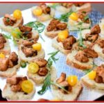 Tasty chicken bites on bread with garnish - MotorChef Cafe Launch