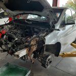 BMW 218i undergoing engine removal at GP MotorWorks