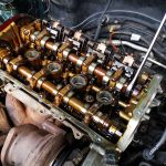 Mini Cooper S in at GP Motor Works for excessive smoking and engine noise - shows engine with cylinder head removed