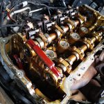 Mini Cooper S in at GP Motor Works for excessive smoking and engine noise - shows timing chain removed