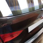 BMW X1 e84 damaged tailgate and rear light cluster in for repair by GP Motor Works