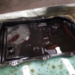 BMW F30 320d - old gearbox sump showing built-in oil filter as part of gearbox service at GP Motor Works
