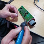 BMW X5 or X6 Electric Parking Brake (EPB) module undergoing repair at GP Motor Works