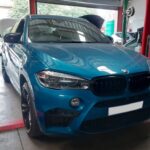 BMW X6M with air suspension problems being repaired at GP Motor works