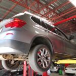 BMW X3 with a bad front steering knocking sound in for repair at GP Motor Works