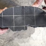 Part of a Diesel Particulate Filter (DPF) showing soot blockage of the honeycomb channels