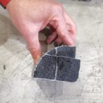 Part of a Diesel Particulate Filter (DPF) showing soot blockage of the honeycomb channels