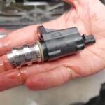 Mini Cooper closeup view of engine oil pressure control valve in for replacement at GP Motor Works